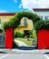 Italy home with shutters and lovely garden gate entrance