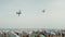 Italy, Jesolo - August 2022. Two military planes fly over Jesolo beach