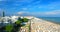 Italy, Jesolo. Lido di Jesolo, or Jesolo Lido, Europe beach and city Venice, Aerial forward dolly, footage in HDR, HFR