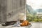 Italy, Latte Macchiato, croissant and newspaper on window sill