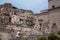 Italy. Matera. The lovely ceramic girls by Margherita Grasselli, look out over the old town from a terrace in Sasso Barisano