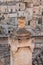 Italy.  Matera.  Rioni Sassi.  Spontaneous architecture.  Decoration on the top of a chimney pot