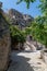 Italy. Matera. Sasso Caveoso. Old paved street. Glimpse with the rocky hill named Monterrone