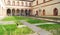 Italy, Milan: Patio`s in Sforza Castle with feral cat