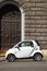 ITALY, ROMA - 21 August, 2016: Micro white car for two person