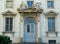 Italy, Rome, Piazza del Quirinale, Quirinal Palace, entrance door to the palace with bas-relief and wrought iron lattice