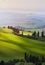 Italy; San Quirico d`Orcia; sunset over Tuscan Valdorcia rolling