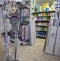 Italy, Scalea - March 15, 2022: Aisle with various goods and products for cleaning, washing, washing in a hardware store. A major