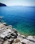 Italy, sea view in the sunny morning with blue and green water under the rocks! Holidays forever!