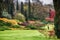 Italy September 2017 - view of the colorful SigurtÃ `s park whit many trees and flowers