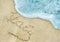 Italy title on the light sand beach near the black sea coast. Italy lettering or inscription on the sand beach