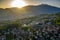 Italy, Trento, 01 May 2019: Panorama of the city at sunset, facade of buildings, Picturesque view of mountains through