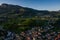 Italy, Trento, 01 May 2019: Panorama of the city at sunset, facade of buildings, Picturesque view of mountains through