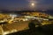 Italy Tuscany Castiglione della Pescaia, pink full moon night, panoramic night picture