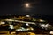 Italy Tuscany Castiglione della Pescaia, pink full moon night, panoramic night picture