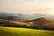 Italy. Tuscany farmland and rolling hills; summer countryside La