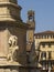 Italy,Tuscany,Florence, Arnolfo tower and lion statue in Santa Croce square.