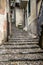 Italy, Varenna, Lake Como, a narrow stone staircase alley