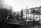 Italy, Venice, February 25, 2017. black and white photo of Venice street with lots of gondolas, river and facades of houses