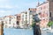 Italy, Venice. Gull in old italian architecture with landmark bridge, romantic boat. Venezia. Grand canal for gondola in travel