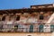 Italy, Verona, old building with a balcony and ancient frescoes