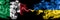 Italy vs Ukraine, Ukrainian smoky mystic flags placed side by side. Thick colored silky abstract smoke flags of Italian and