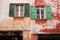 Italy, window of a portico of Bologna