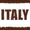 ITALY. Word created from coffee beans isolated on a white backgr