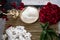 Items for the Indian Yajna ritual. garland of white flowers, red rose petals and copper dish with rice for Hindu Vedic Yajna