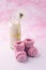 Its a girl pink theme baby shower or sip and see party background with decorative elements - booties and milk bottle