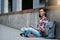 Its my favourite book. Full length portrait of an attractive young female student reading a book while sitting outside