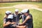 Its where winners are made. a group of young men huddled together at a baseball game.