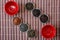 Ivan tea, rooibos marrakech, black tea, green tea and red cups on a brown bamboo mat