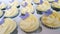 Ivory frosted cupcakes with purple butterflies