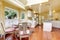 Ivory and white kitchen room with dining table set