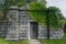 An ivy-covered stone crypt in the Sleepy Hollow Cemetery