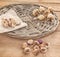 Ixia and muscari bulbs on a wooden table