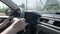 Izhevsk, Russia, August 16, 2022. Person steering wheel with one hand close up