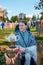 Izmailovsky Park, Moscow, Russia-October 1, 2016: descendants of Cossacks at the fair and Cossack gathering. A woman sells bagels