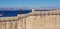 Izmir Cesme castle, wide angle view of the marina from the outer walls of the castle