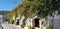 Izmir Cesme historical wall and the bougainvillea and vines adorning it