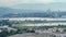 Izmir cityscape with roads and harbour. Clouds motion over city