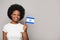 Izraeli woman holding flag of Izrael. Education, business, citizenship and patriotism concept