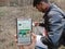 jabalpur, India - December 2019: spitwise app displayed on smart phone screen with holded mobile