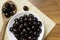 Jabuticaba in the wooden spoon and bowl. Jaboticaba or Jabuticaba is the native Brazilian grape tree. Species Plinia Cauliflora. B