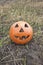 Jack lantern for Halloween of a basketball on scorched earth