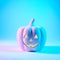 A Jack O Lantern glowing with neon light on Halloween evening. Pastel colors