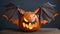 Jack o lantern pumpkin with bat wings on the side