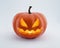 Jack-o-lantern pumpkin with orange light isolated on white. Clipping path.