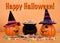 Jack o lanterns wearing witch hats with cauldron of candy